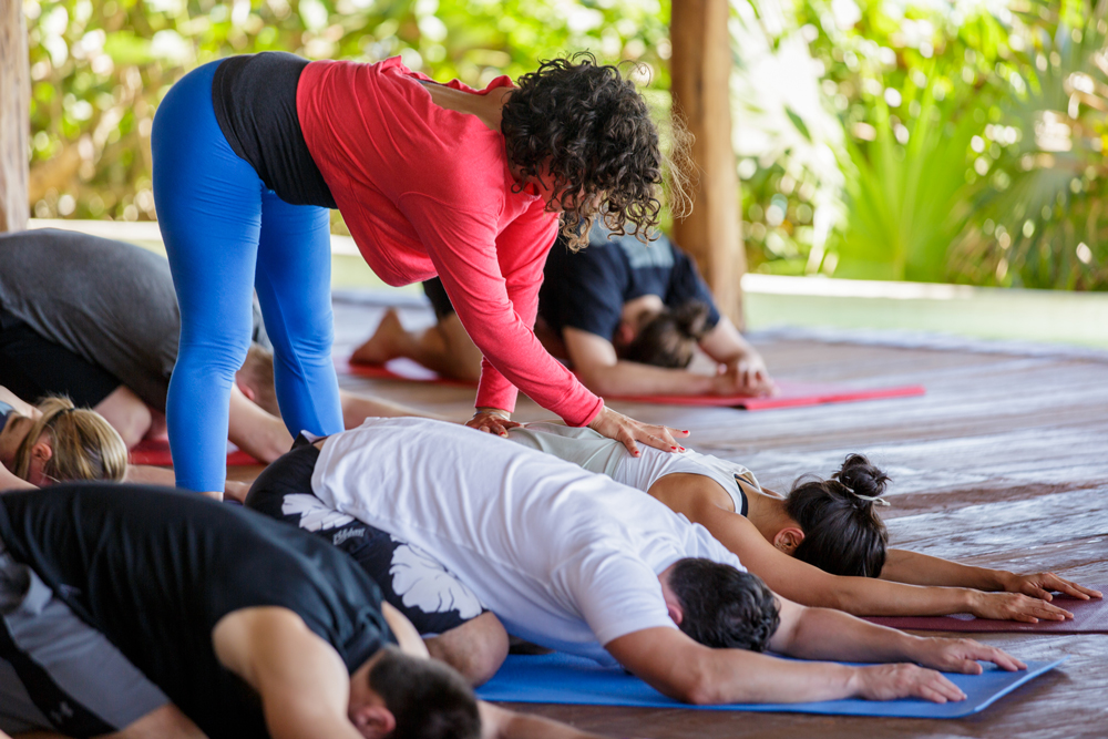 Students performing childs pose